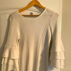 White sweater with ruffled sleeves